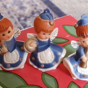 3 tiny plastic angels in blue.